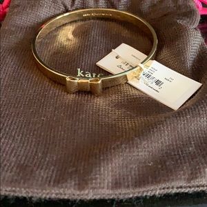 Kate Spade gold bracelet with bow detail